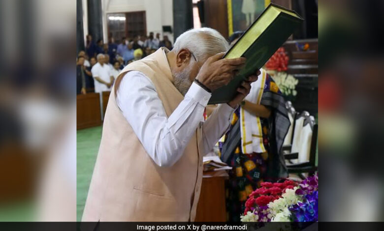PM Modi Touches Constitution To Forehead At NDA Meeting