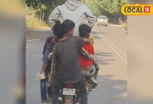 This person is riding a bike with children hanging on it like a bag, the video is going viral on social media