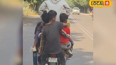 This person is riding a bike with children hanging on it like a bag, the video is going viral on social media