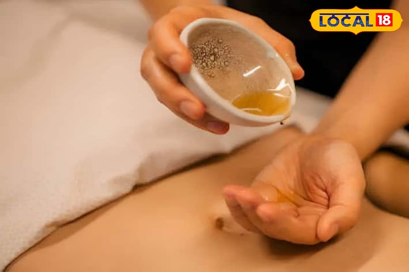 सिर्फ 2 बूंद तेल, नाभि में तेल डालने से त्वचा को मिलती है नमी...